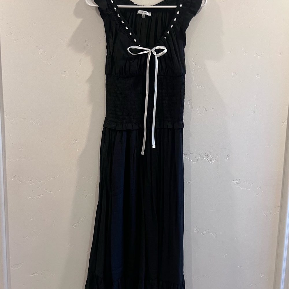 Black Dress with White Ribbon Accent